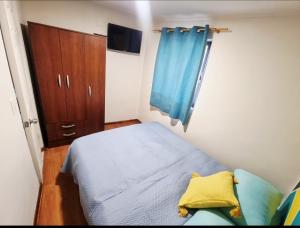 Postel nebo postele na pokoji v ubytování El Chalet del Gato, apartamento 1