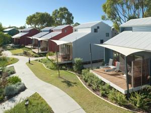 an aerial view of a row of houses at Frangipanis at Footprints in Preston Beach