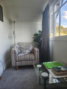 Et opholdsområde på Bridge Street Homestay