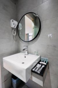 Et badeværelse på Hotel 99 Seri Kembangan Serdang