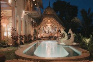 Bazén v ubytování Atelier Ubud Art Lofts nebo v jeho okolí