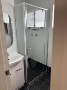 Et badeværelse på Batemans Bay North Tourist Park + 11 billeder