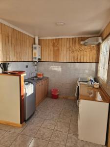 Kuchyň nebo kuchyňský kout v ubytování Lago Ranco, cabaña orilla de lago + 14 fotografií