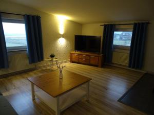 TV/trung tâm giải trí tại Fewo-Nordseebaer