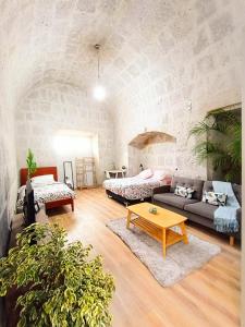 Giường trong phòng chung tại Central Apart Hotel