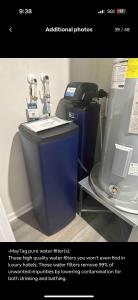 una pubblicità per un contatore dell'acqua in un negozio di Modern Theme Private Room a Suffolk