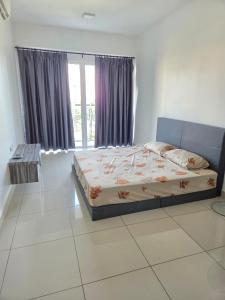 Postel nebo postele na pokoji v ubytování 3BR Condo near Queensbay, Penang