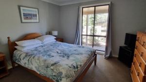 En eller flere senge i et værelse på Holiday With Your Pet! Wifi