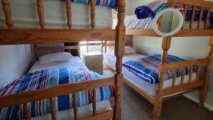 En eller flere senge i et værelse på Holiday With Your Pet! Wifi