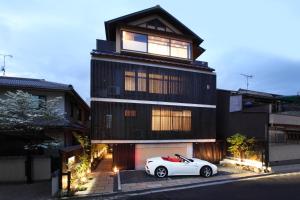 a white car parked in front of a house at Wakasa Annex in Nara +69 photos