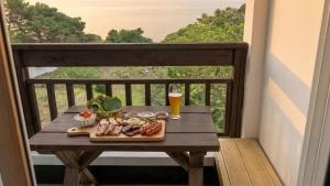 En balkon eller terrasse på Gangneung Undukmaru Pension