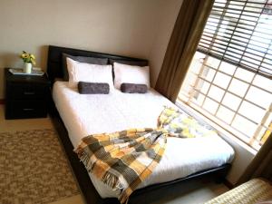 En eller flere senge i et værelse på Nested at L&MX + 2 billeder