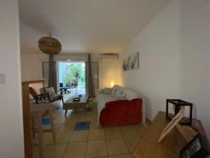 Et opholdsområde på T3 Hevi - 68m2 avec terrasse extérieure et piscine commune - La Saline-les-Bains