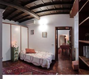 A bed or beds in a room at Nido tra le cupole, terrazza panoramica, Wi-Fi , AC