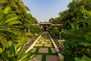 an overhead view of a garden with trees and a pathway at Glory of MJ, Family Resort in Nature, Panvel in Panvel