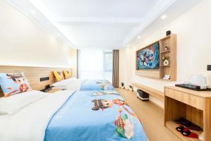 TV a/nebo společenská místnost v ubytování Huangshan Danqing Elegant Garden Smart Vacation Villa Boutique Guesthouse