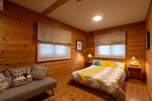 En eller flere senge i et værelse på yado suzuka