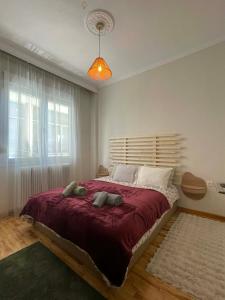 En eller flere senge i et værelse på Anastasia's House