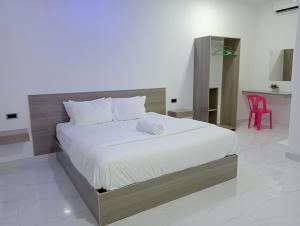 En eller flere senge i et værelse på Secret Escape