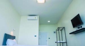 Et tv og/eller underholdning på Phala Shore Resort