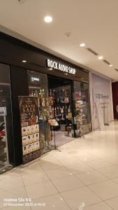 a rock mudro shop in a shopping mall at Mesahill Premier Suite-Wi-Fi-NETFLIX in Nilai