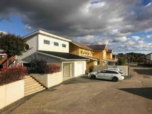 a white car parked in front of a house at Private apartment with hotel feeling in Hudiksvall