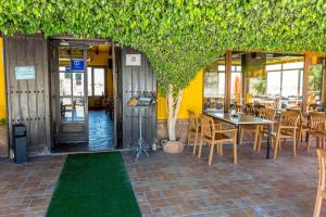 Restoran ili drugo mesto za obedovanje u objektu Camping Rural Presa La Viñuela