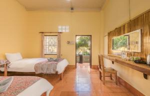 En eller flere senge i et værelse på Nong Khiaw Meexai Sunset View