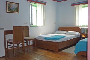 Postel nebo postele na pokoji v ubytování Guesthouse Iro