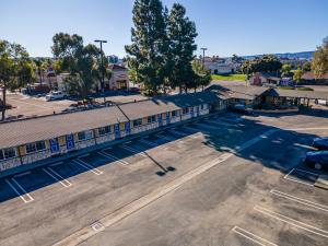 an aerial view of a building with a parking lot at Town and Country Inn in Santa Maria