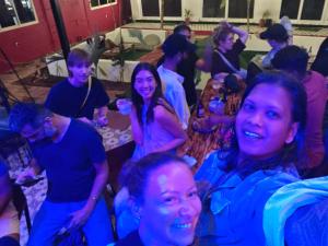 a group of people sitting at a party at Mitra Palolem in Palolem