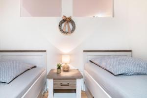 Giường trong phòng chung tại Zum Waldblick