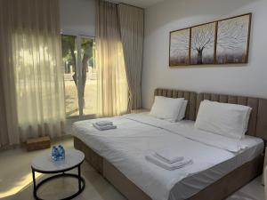 Postelja oz. postelje v sobi nastanitve Sky5 Apartment