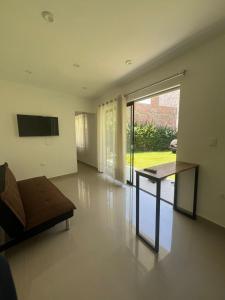 Et tv og/eller underholdning på La Casita de Condoray - Lunahuana + 19 billeder