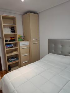 Postel nebo postele na pokoji v ubytování 80 m2 recién reformado, acogedor y elegante.