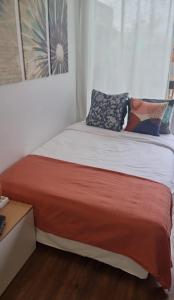 En eller flere senge i et værelse på Beautiful Studio at Geneva airport Ferney Voltaire