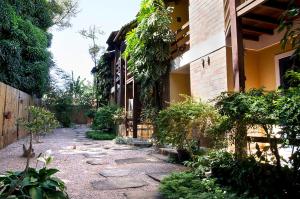 a stone path in front of a building at Pousada Mundo Dha Lua in Sao Jorge