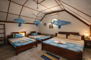 En eller flere senge i et værelse på Suduweli Beauties of Nature - Yala