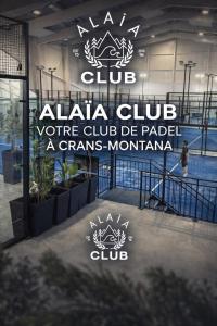 Et logo, certifikat, skilt eller en pris der bliver vist frem på Alaïa Lodge