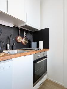 Køkken eller tekøkken på Beautiful Studio Apt in the Heart of Turku