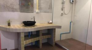 Koupelna v ubytování Phumanee Home Hotel + 129 fotografií