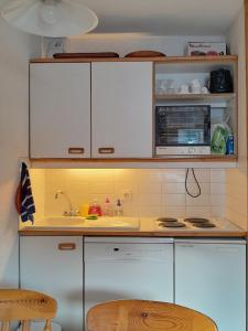 Køkken eller tekøkken på Cosy at L'Atrey La Tania