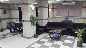 Χώρος καθιστικού στο Orchida St. George Hotel