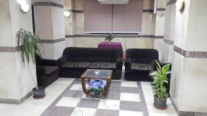 Χώρος καθιστικού στο Orchida St. George Hotel