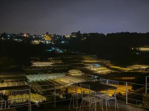 a view of a parking lot at night at The LOOP Boutique Hotel & Café in Da Lat