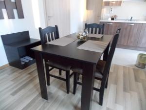 A kitchen or kitchenette at Apart Hotel Rosen