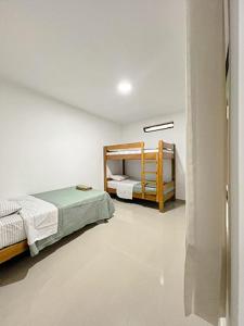 En eller flere senge i et værelse på La Casita de Condoray - Lunahuana