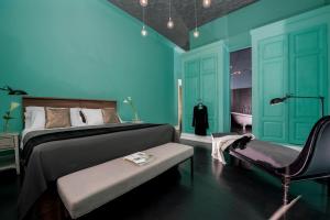 Llit o llits en una habitació de Daniele Manin Guesthouse