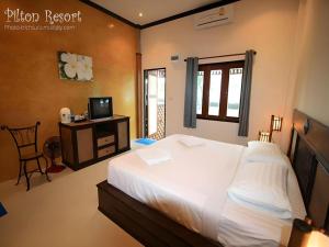 Giường trong phòng chung tại Pilton Resort