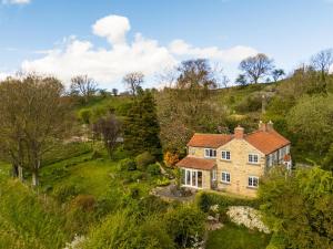 an aerial view of a house on a hill at 3 Bed in Ampleforth oc-m34673 in Ampleforth